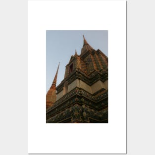 Unusual low angle view of a Buddha pagoda against clear sky. Posters and Art